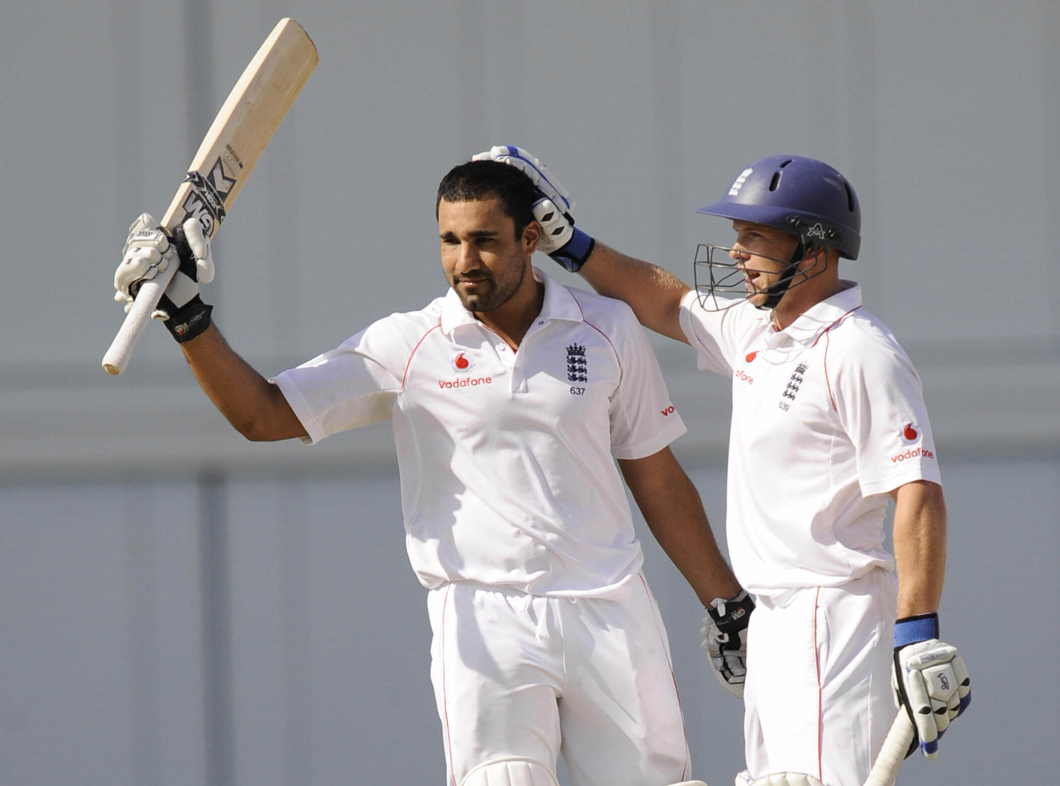 Ravi Bopara raises his bat as he is congratulated by Tim Ambrose after scoring his first Test century in 2009