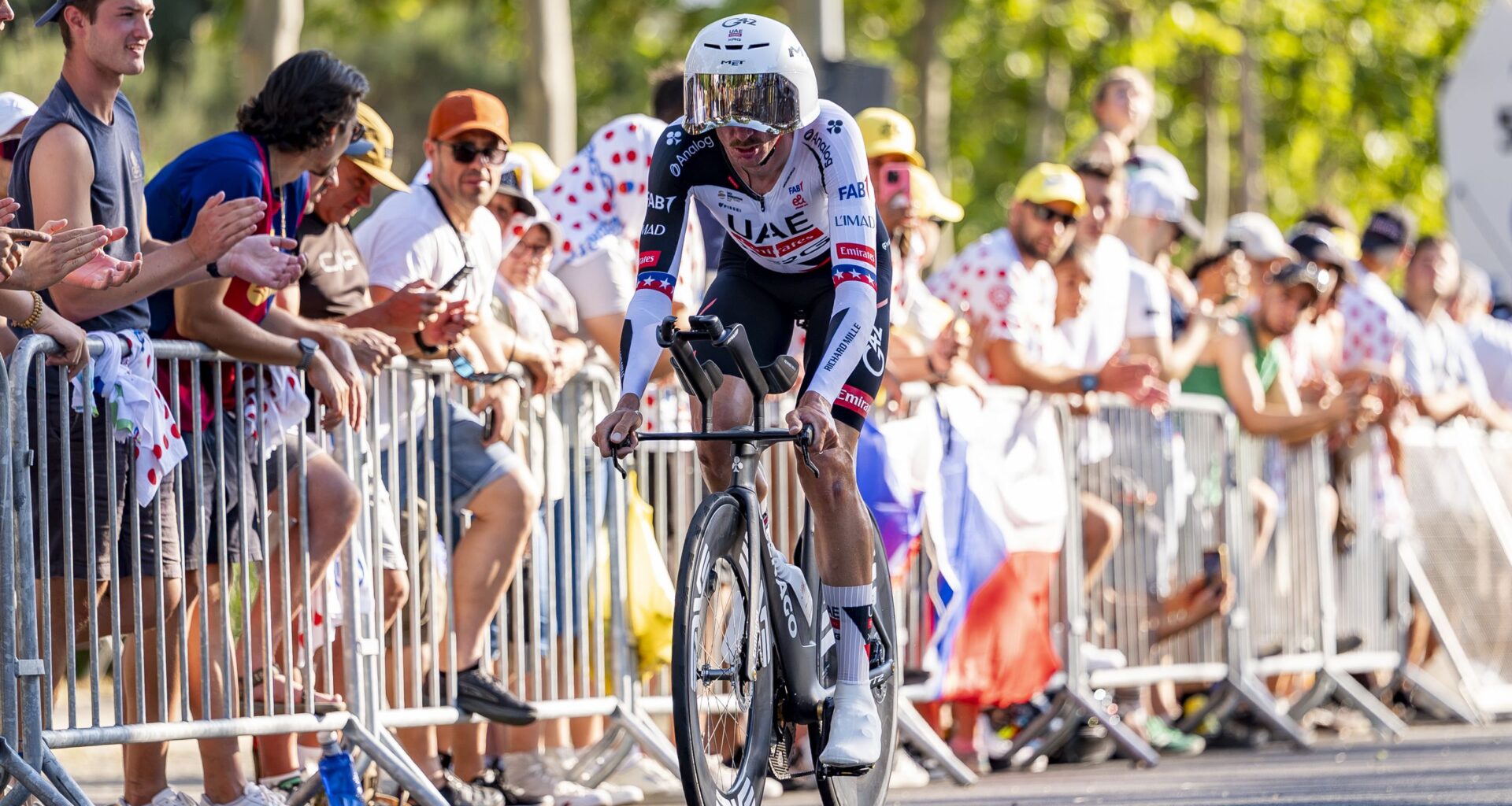 US rider Brandon McNulty knocked off bike by car driver before Tour de France time trial on stage 16