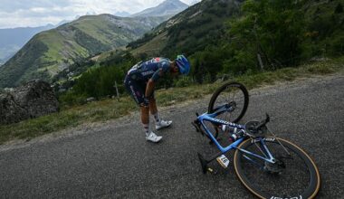 Soudal Quick-Step team's Belgian rider Ilan Van Wilder awaits technical assistance on the roadside during the 20th stage of the 113th edition of the Tour de France cycling race, 170,9 km between Le Bourg-d'Oisans and Alpe d'Huez in the French Alps, on July 25, 2026. (Photo by Loic VENANCE / AFP)