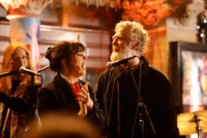 Imelda May and Glen Hansard performing at the annual busk on Dublin's Grafton street in aid of the Simon Community in 2024. 
Photograph: Alan Betson 