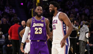 LOS ANGELES, CA - FEBRUARY 5: Joel Embiid #21 of the Philadelphia 76ers and LeBron James #23 of the Los Angeles Lakers smiles before the game on February 5, 2026 at Crypto.Com Arena in Los Angeles, California. (Photo by Jim Poorten/NBAE via Getty Images)