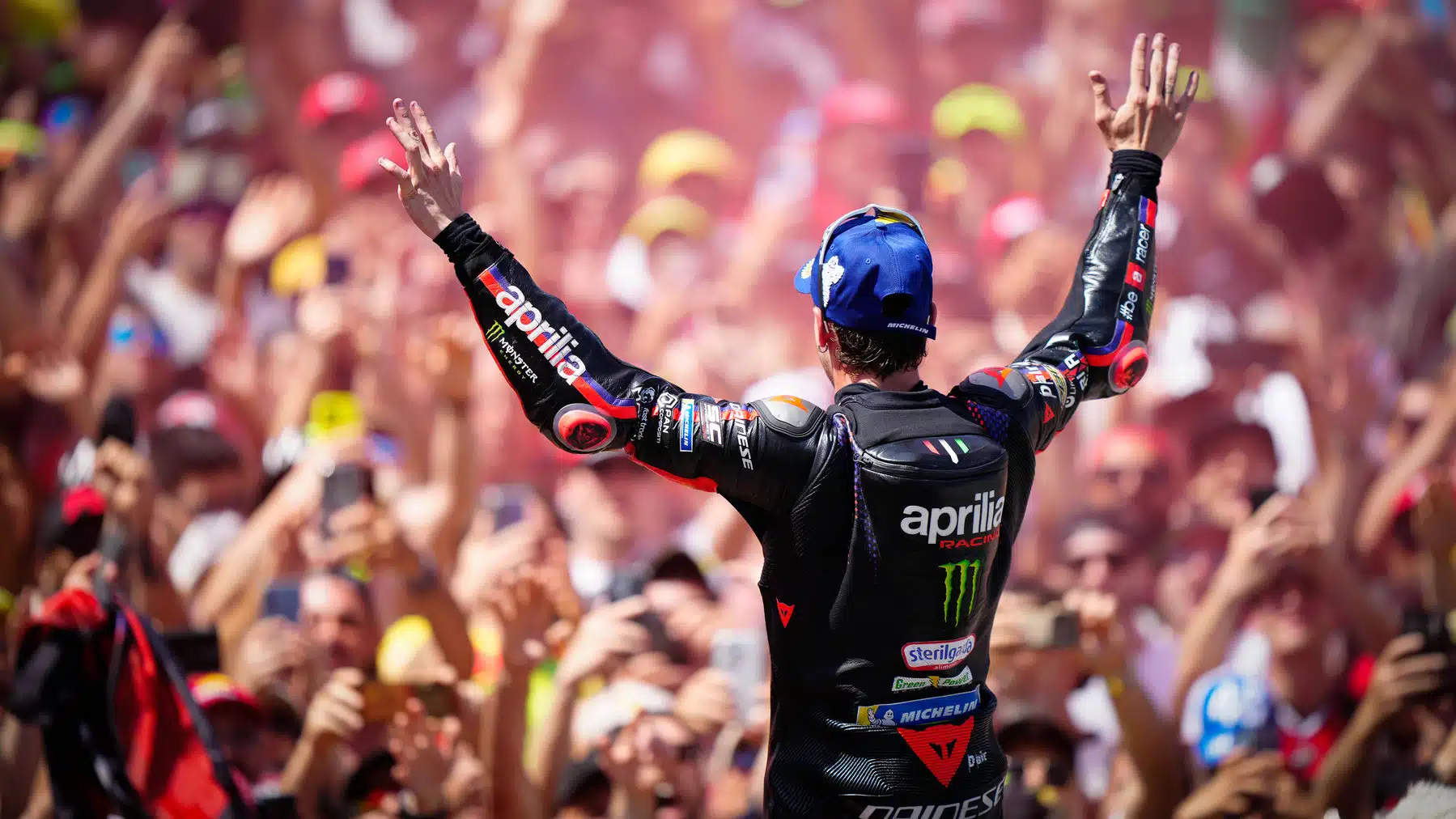 Marco Bezzecchi celebrates in front of the vast crowd at Mugello