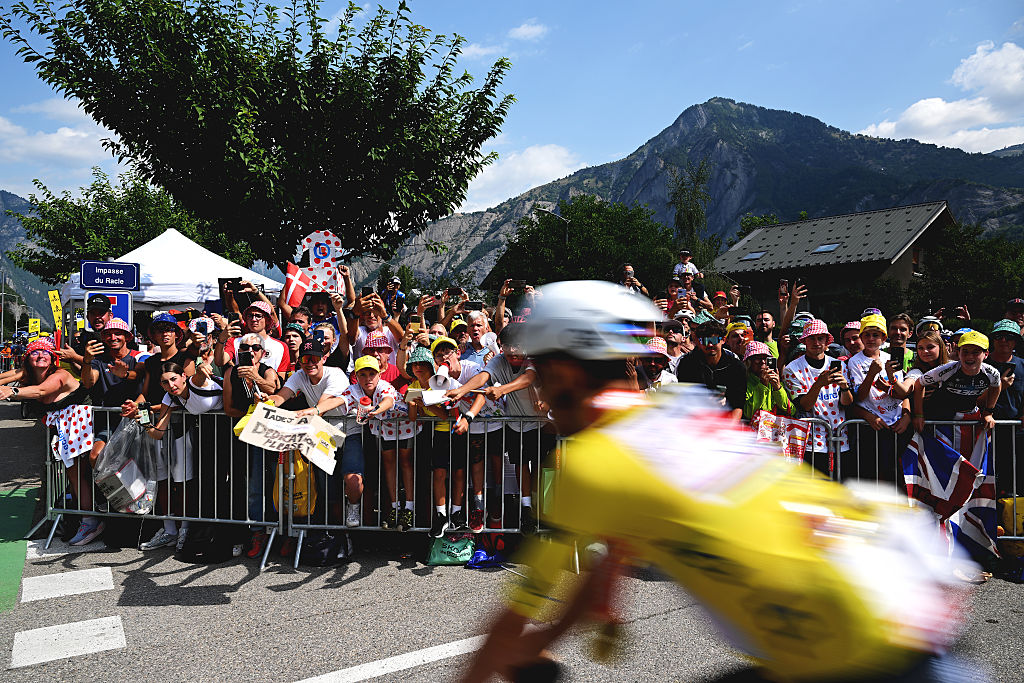 LE BOURG D&amp;apos;OISANS, FRANCE - JULY 25: Tadej Pogacar of Slovenia and UAE Team Emirates - XRG - Yellow Leader Jersey while fans cheers prior to the 113th Tour de France 2026, Stage 20 a 170.9km stage from Le Bourg d&amp;apos;Oisans to Alpe d&amp;apos;Huez 1842m / #UCIWT / on July 25, 2026 in Le Bourg d&amp;apos;Oisans, France. (Photo by Dario Belingheri/Getty Images)