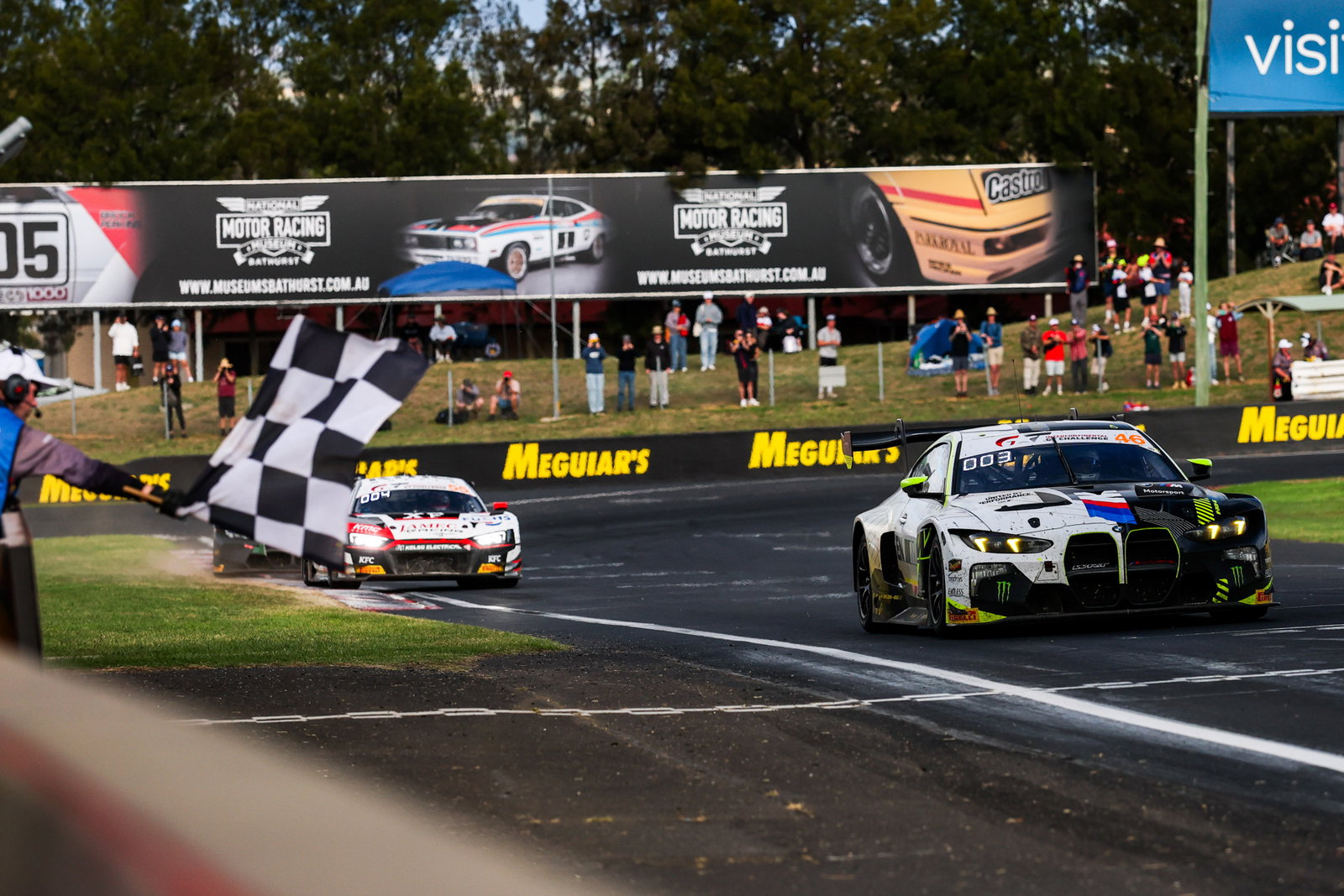 The #46 Team WRT BMW M4 GT3 takes the chequered flag during the Bathurst 12 Hour in 2026.