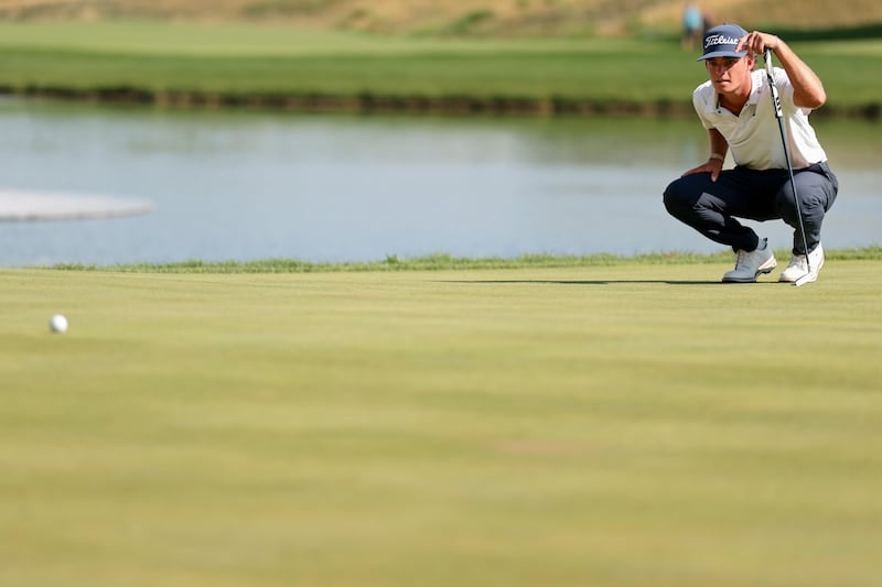 Jackson Koivun of the United States lines up a putt on the 18th green during the final round of the 3M Open 2026. Photograph: Andrew Wevers/Getty Images