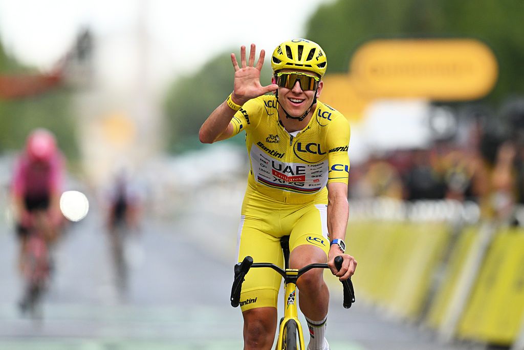 Tadej Pogacar of Slovenia and UAE Team Emirates-XRG celebrates at finish line as final overall winner during the 113th Tour de France 2026