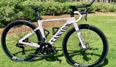 Canyon Aeroad CFR with Shimano Dura-Ace Di2 and GEAR GROOVE aero extensions, fitted with DT Swiss carbon wheels, photographed on grass