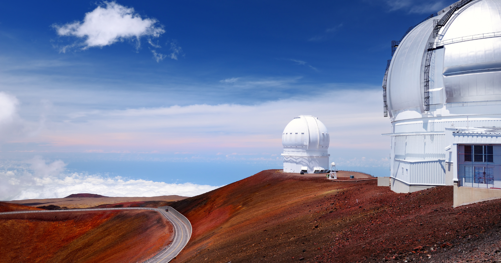 At the summit of Mauna Kea in Hawaii, the air is so thin and so dry that astronomers can see light from galaxies billions of light-years away with a clarity impossible at sea level — which is why 11 countries have built 13 major telescopes on what is technically a dormant volcano