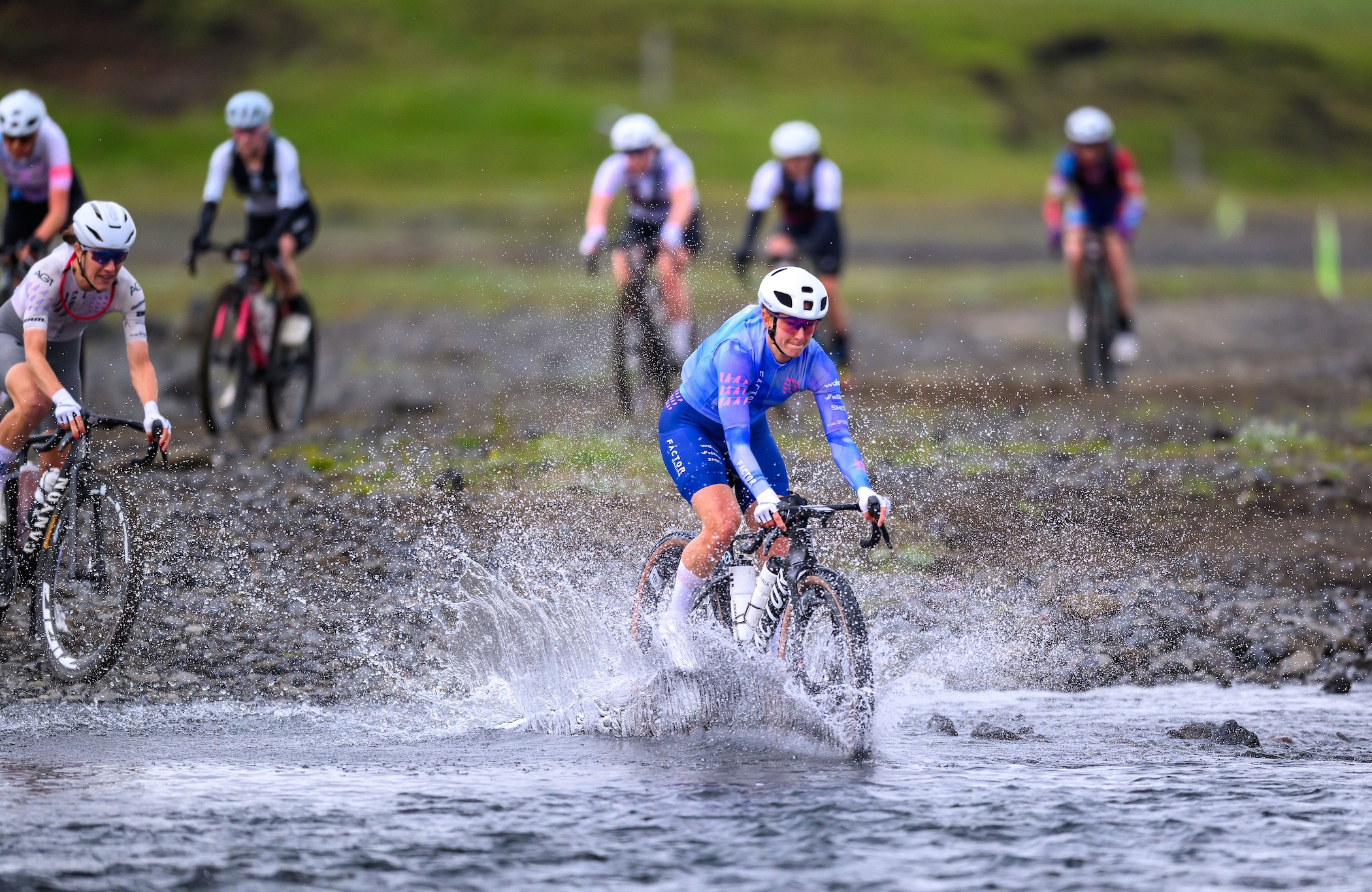 The Rift 200km pro women's winner in 2026 Haley Smith leads in water crossing ahead of 2025 winner Rosa Klöser