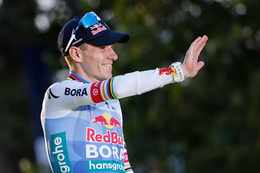 PARIS, FRANCE - JULY 26: Second place of the Tour Remco Evenepoel of Belgium and Red Bull - BORA - hansgrohe during the podium ceremony following Stage 21 of the 113th Tour de France 2026, final stage of 88,7 km between Paris Champs Elysees and Paris Champs Elysees on July 26, 2026 in Paris, France. (Photo by Jean Catuffe/Getty Images)