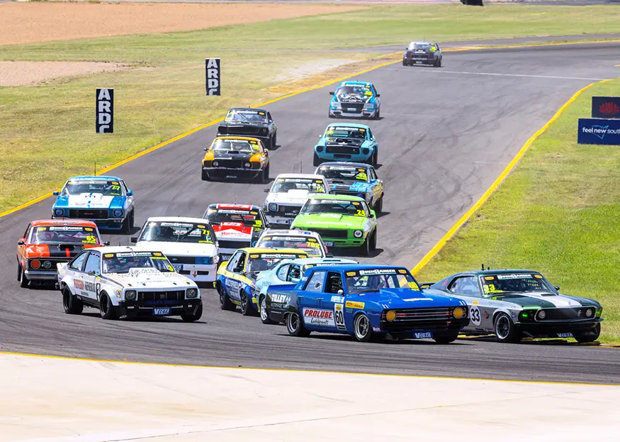 Cameron Tilley's Chrysler Valiant Pacer leads Steven Johnson and the Touring Car Masters field at Sydney Motorsport Park.