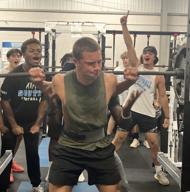 Trent Chmura of South is cheered on by teammates during a lifting workout July 27. The Rebel football team is looking to win its first league title since 2014 this fall and will do so in the new-look Chagrin Valley Conference. (John Kampf/The News-Herald)