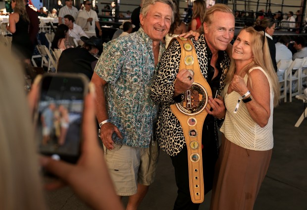 Jean Charles-Boisset poses with friends during the inaugural Napa Knockout at Raymond Vineyards near St. Helena, Saturday, July 25, 2026. (Kent Porter / The Press Democrat)