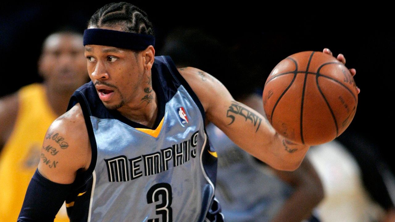 Memphis Grizzlies' Allen Iverson brings the ball upcourt against the Los Angeles Lakers during an NBA basketball game in Los Angeles. (Lori Shepler/AP)