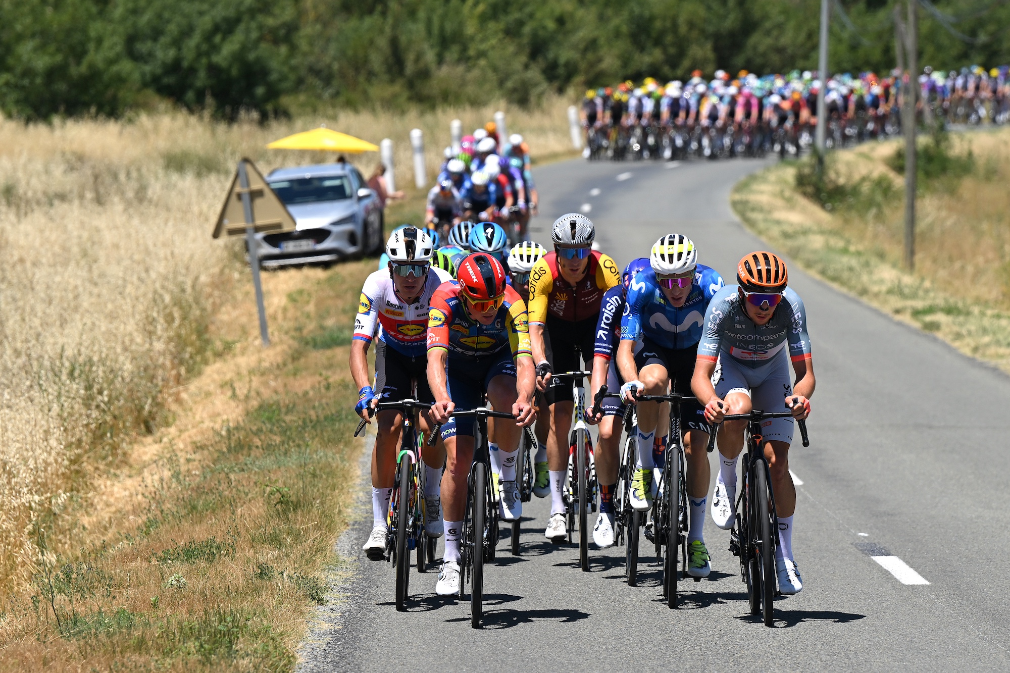 CARCASSONNE, FRANCE - JULY 07: (L-R) Mathias Vacek of Czech Republic and Team Lidl - Trek, Mads Pedersen of Denmark and Team Lidl - Trek, Alex Kirsch of Luxembourg and Team Cofidis, Pablo Castrillo of Spain and Team Movistar and Kevin Vauquelin of France and Netcompany INEOS Cycling Team compete in the breakaway during the 113th Tour de France 2026, Stage 4 a 181.9km stage from Carcassonne to Foix / #UCIWT / on July 07, 2026 in Carcassonne, France. (Photo by Dario Belingheri/Getty Images)