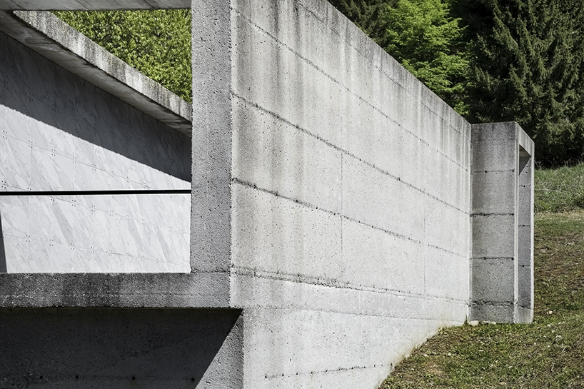 three cemeteries emerge between stone walls and mountain horizons in the carnic alps - 2
