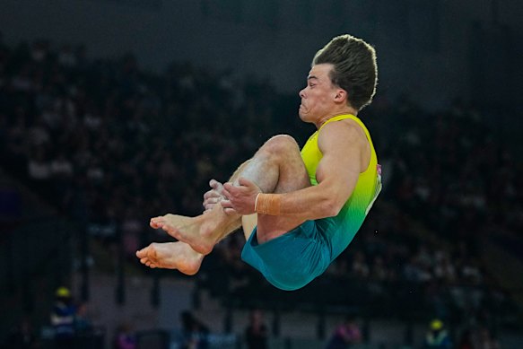 Jesse Moore tumbles on the floor.