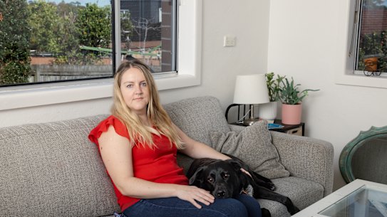 Gina Chatellier and her dog Monty at their rental property in the Five Dock-area.