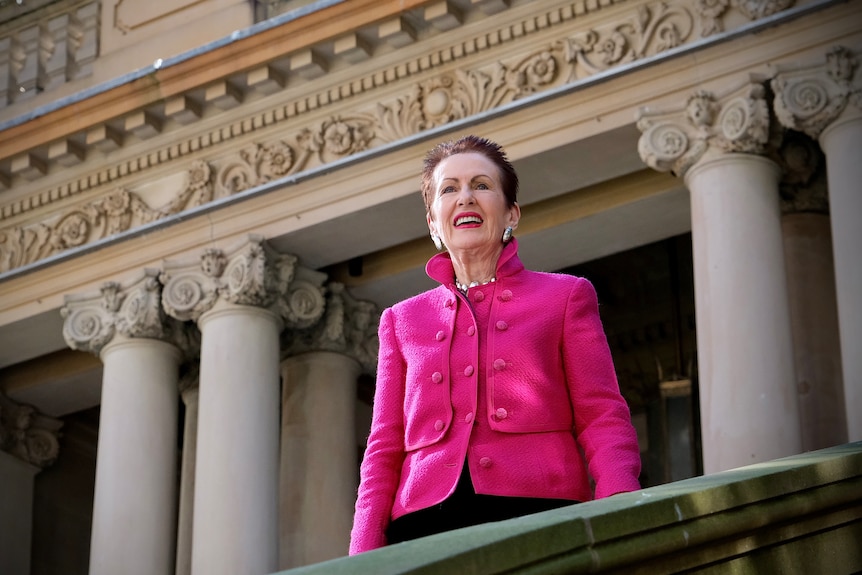 City of Sydney Lord Mayor Clover Moore with City Hall behind her