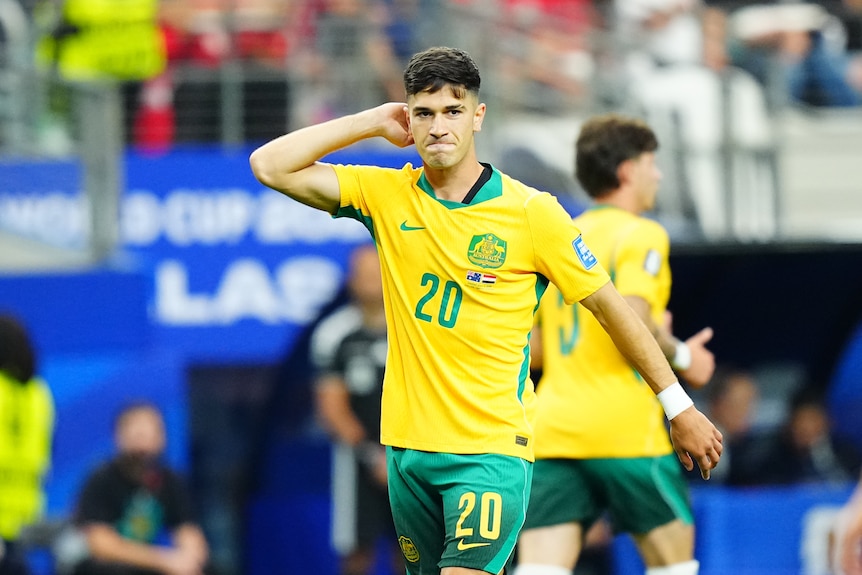 Cristian Volpato scratches head with right hand