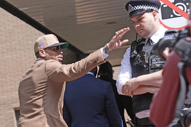 Chris Brown arrives at Southwark Crown Court, where he is charged over an alleged assault in a London nightclub, in London, Friday, July 24, 2026.