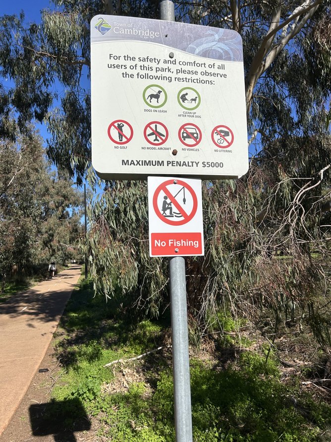 A sign at Galup that locals say is not near where kids are fishing.