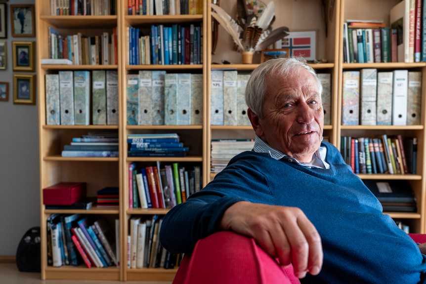 Former Norwegian government veterinarian Trygve Poppe sits on a couch.