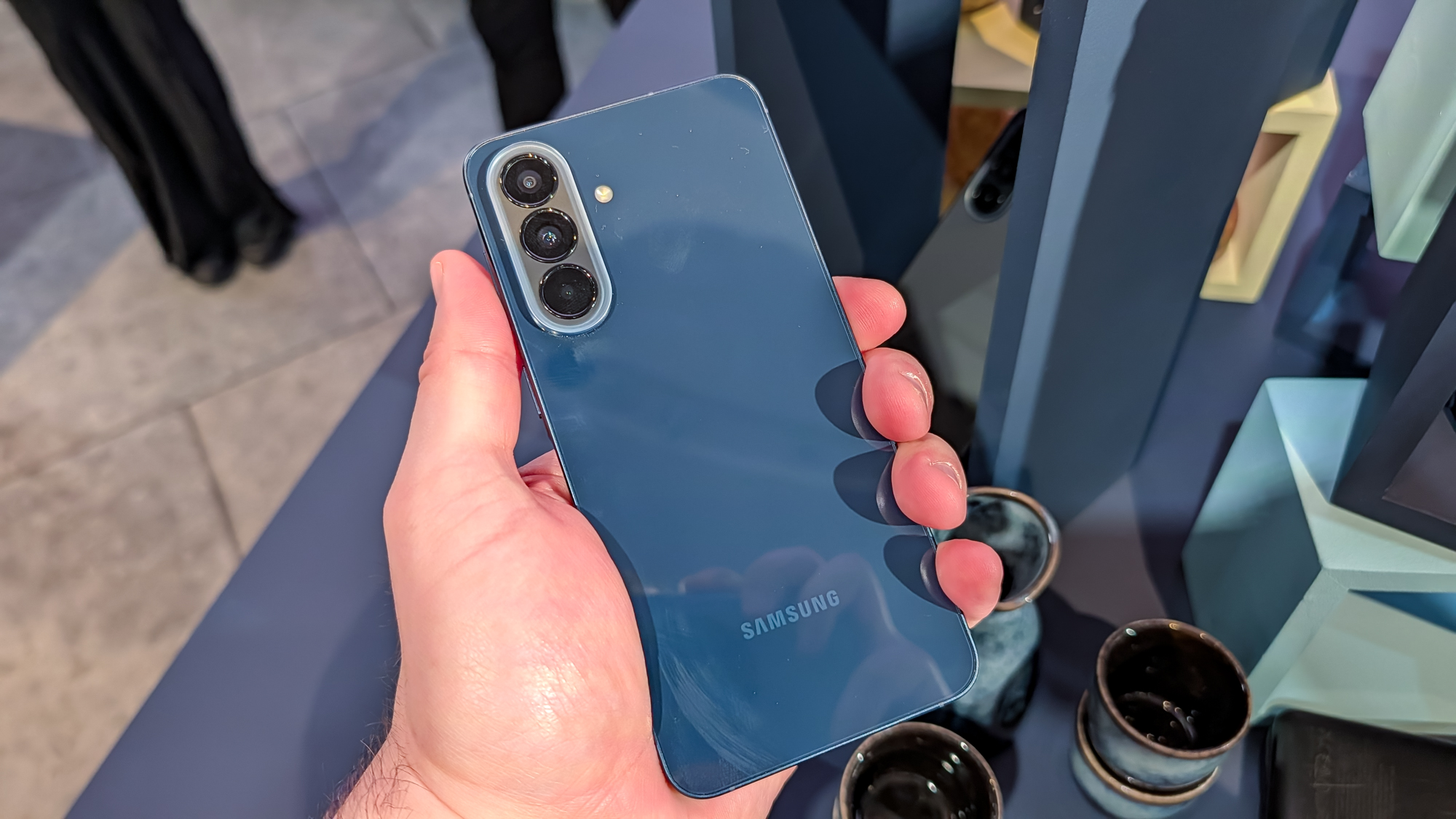 samsung galaxy a37 held in the hand