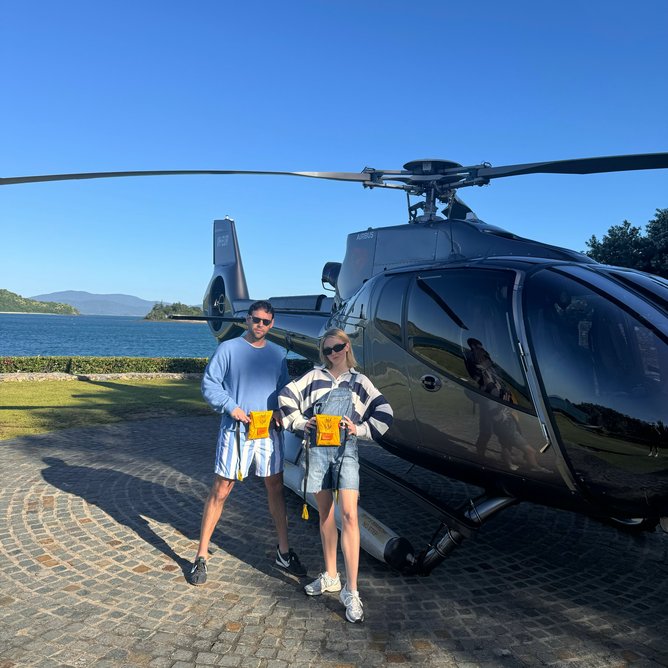 Sydney Sweeney and Scooter Braun before a helicopter ride.