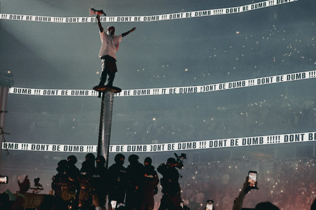 A$AP Rocky Holds Fan's Sign Seemingly Dissing Drake During Show