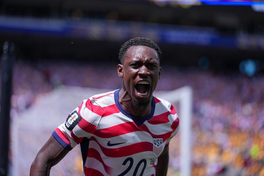 Folarin Balogun celebrates after a goal in a soccer match