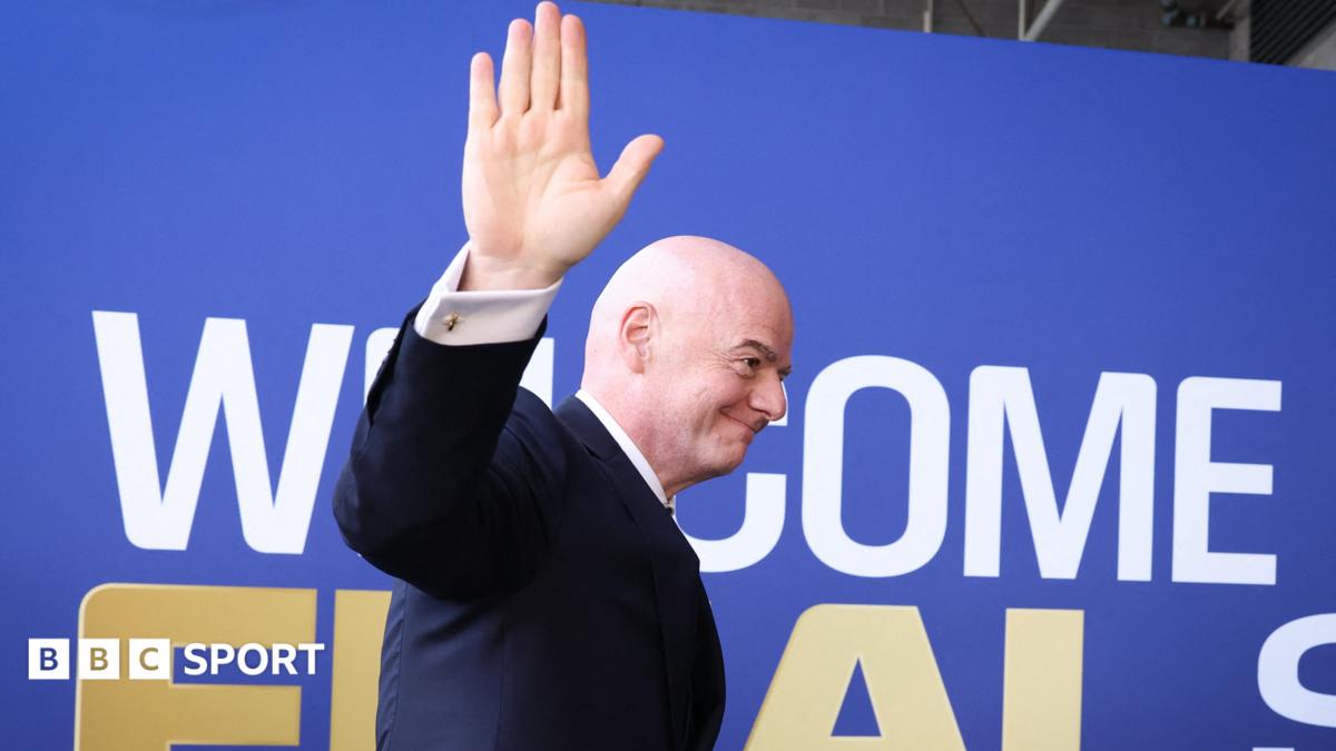 Fifa president Gianni Infantino waves while walking