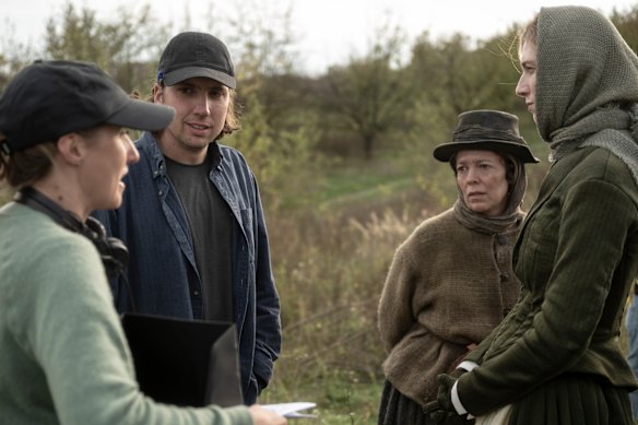 Married writer-directors Eleanor Wilson and Alex Huston Fischer on the set of their film Wicker with Olivia Colman as the Fisherwoman and Elizabeth Debicki as the Tailor’s Wife.