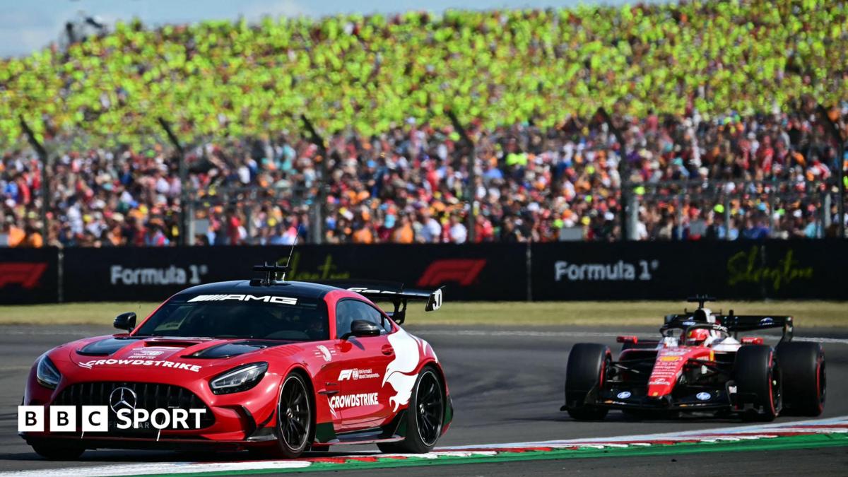 The safety car with eventual race winner Charles Leclerc, of Ferrari, immediately behind in the closing stages of the British Grand Prix