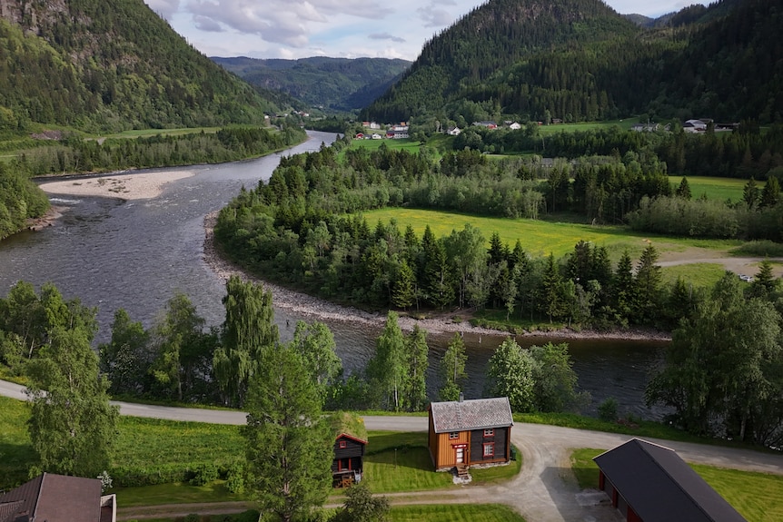 A river winds its way through green countryside