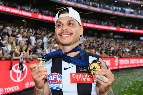 Hill after the 2023 grand final with the Norm Smith and premiership medals.