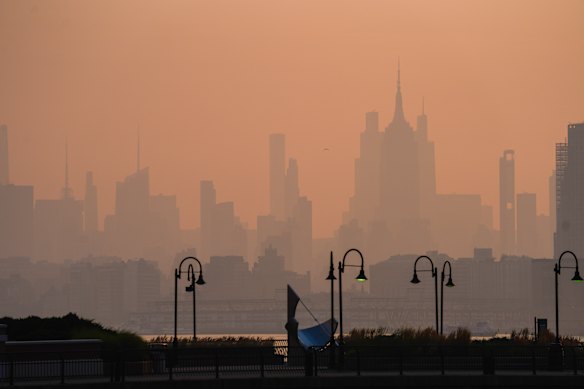 The New York City skyline seen through wildfire smoke haze from Jersey City on Friday July 17.