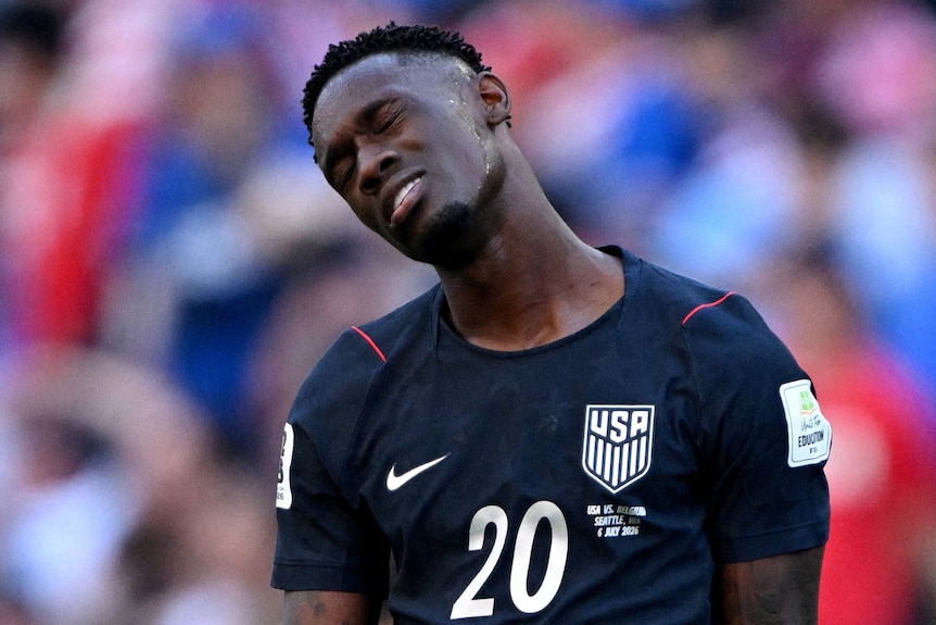 Folarin Balogun of the US looks dejected against Belgium.