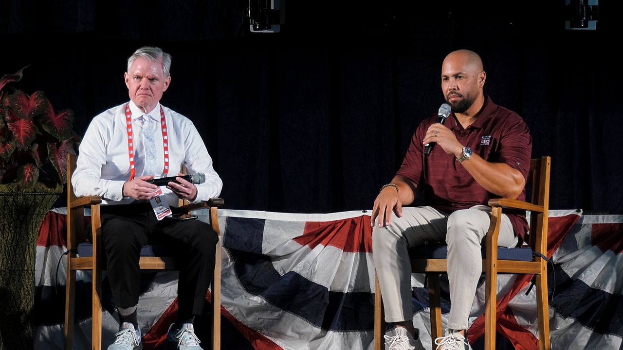 Carlos Beltrán taking questions from reporters at the Clark Sports Center on Saturday ahead of the induction ceremony on Sunday.
