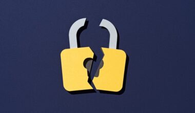 Paper Craft of Cracked Yellow Lock on Purple Background Front View, Data Security Concept.