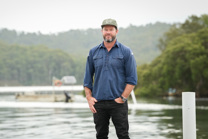 Man standing on a wharf.
