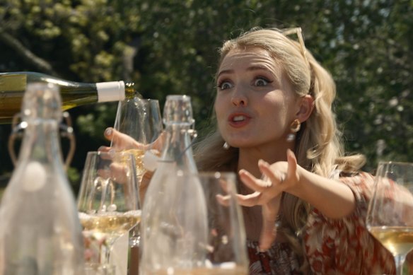 Isabel (Annelise Hall) loosens up over lunch.
