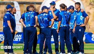 Greece's players comes together to celebrate a wicket at a European Cricket Network event in 2024