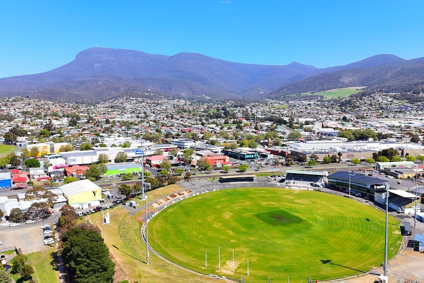 Drone shot of suburban Glenorchy with an oval in foreground
