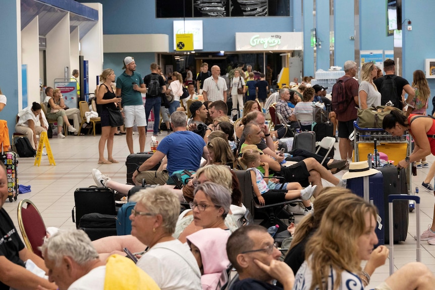 A busy airport departure gate 