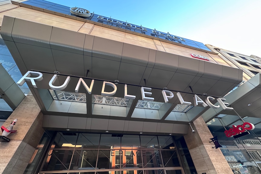 The glass facade and signage in front of Rundle Place shopping centre