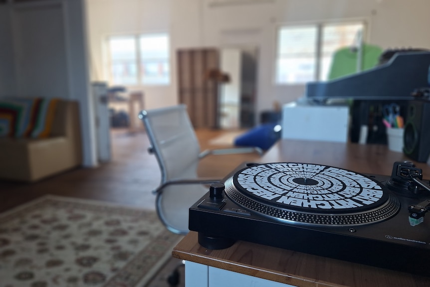 Close up shot of a desk with a dj turnstile.