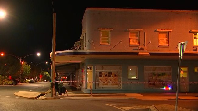 Police cordoned off a business on Denham St after finding the woman’s body.