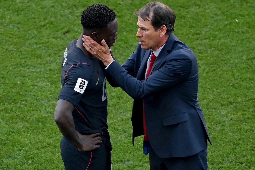 Folarin Balogun is consoled by Rudi Garcia.