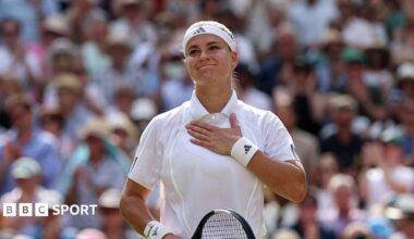 Karolina Muchova acknowledges the crowd at Wimbledon in 2026